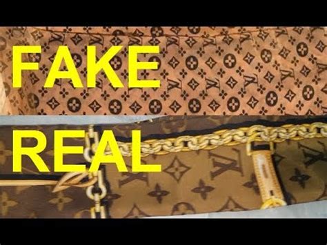 authentic vs fake louis vuitton monogram shawl tag|More.